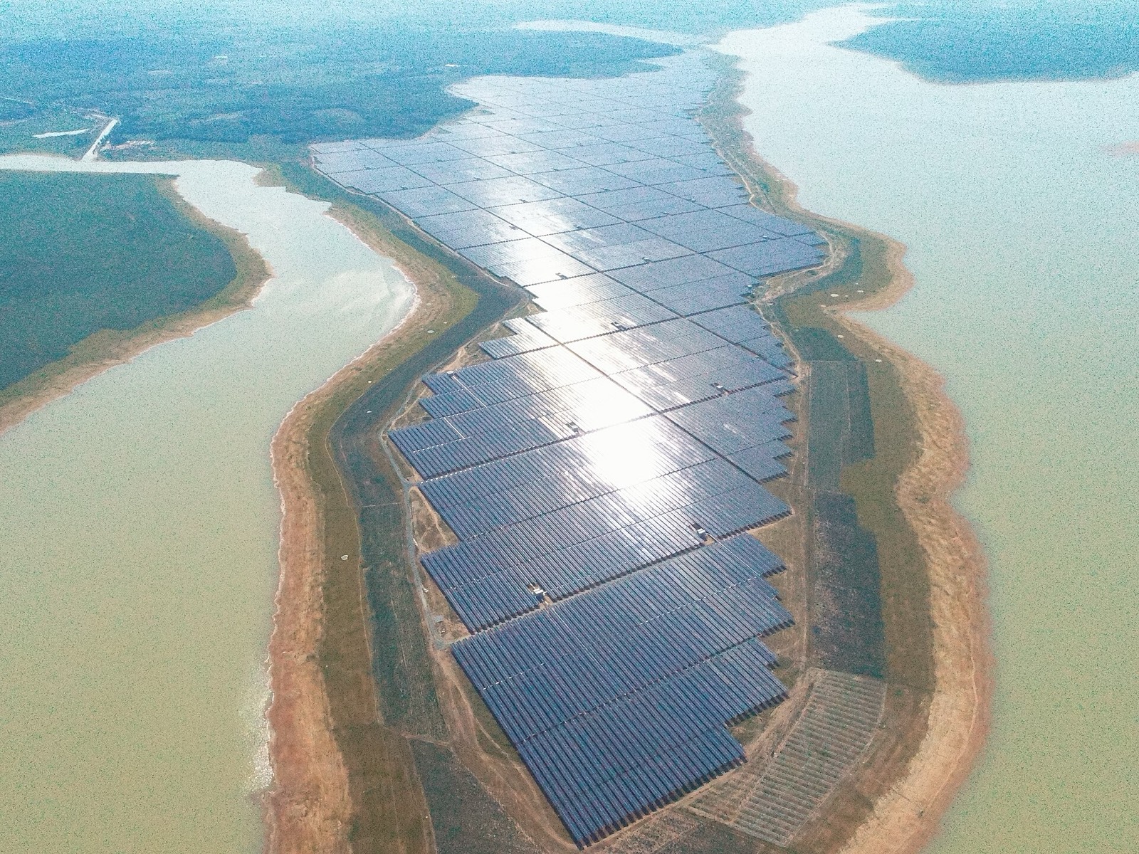 An aerial view of the Dau Tieng solar power plant on a reservoir in Vietnam